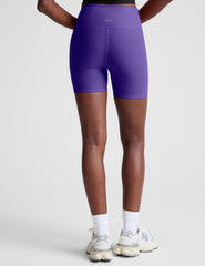 purple high-waisted 5" inseam biker shorts.