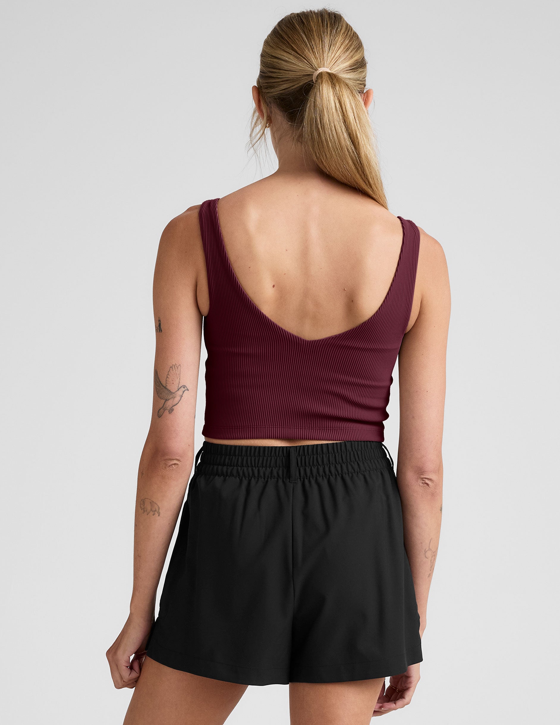 red cropped ribbed tank top with a soft v neckline.