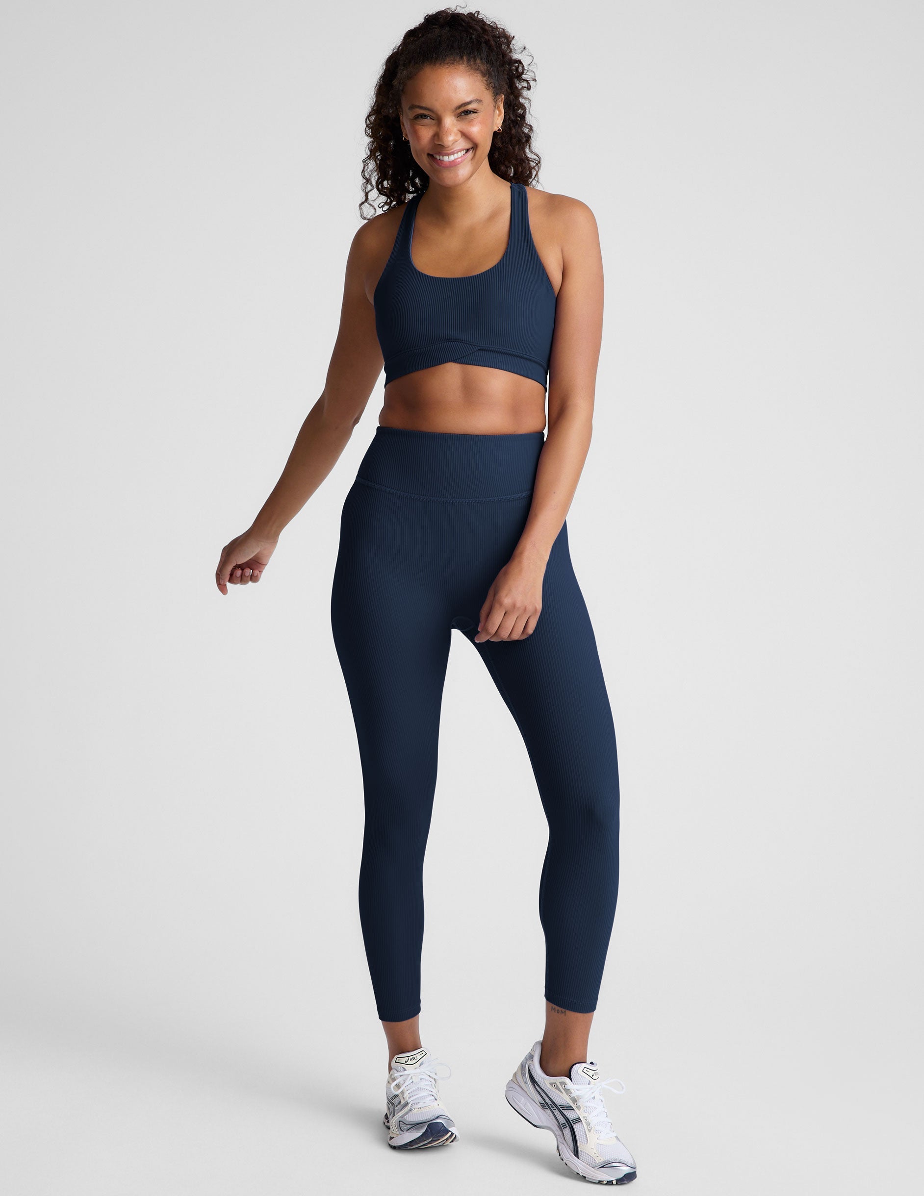 blue racerback bra with a scoop neckline​
and overlapping hemband detail​. 
