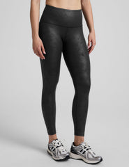 black faux leather high-waisted midi leggings.