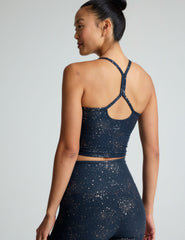 blue slim racerback cropped tank top with a gold star print.