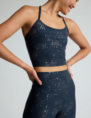 blue slim racerback cropped tank top with a gold star print.