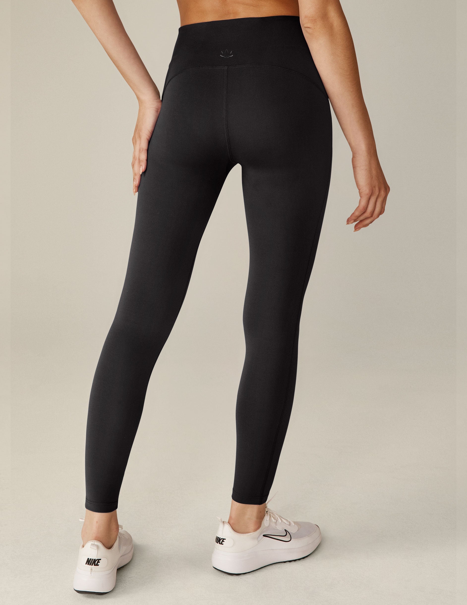 black 4-inch waistband midi leggings.