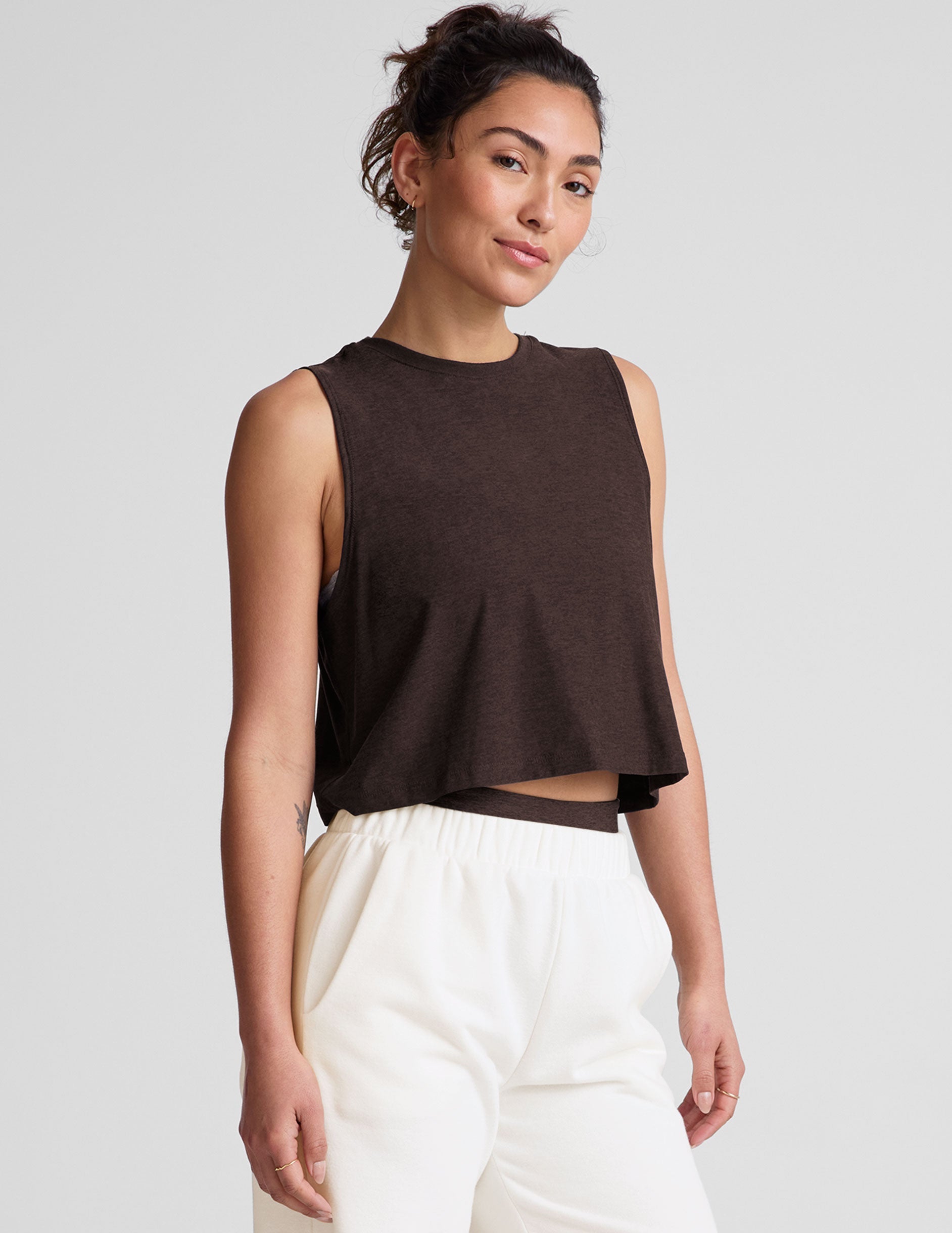 brown relaxed fit cropped tank top with a crew neckline.