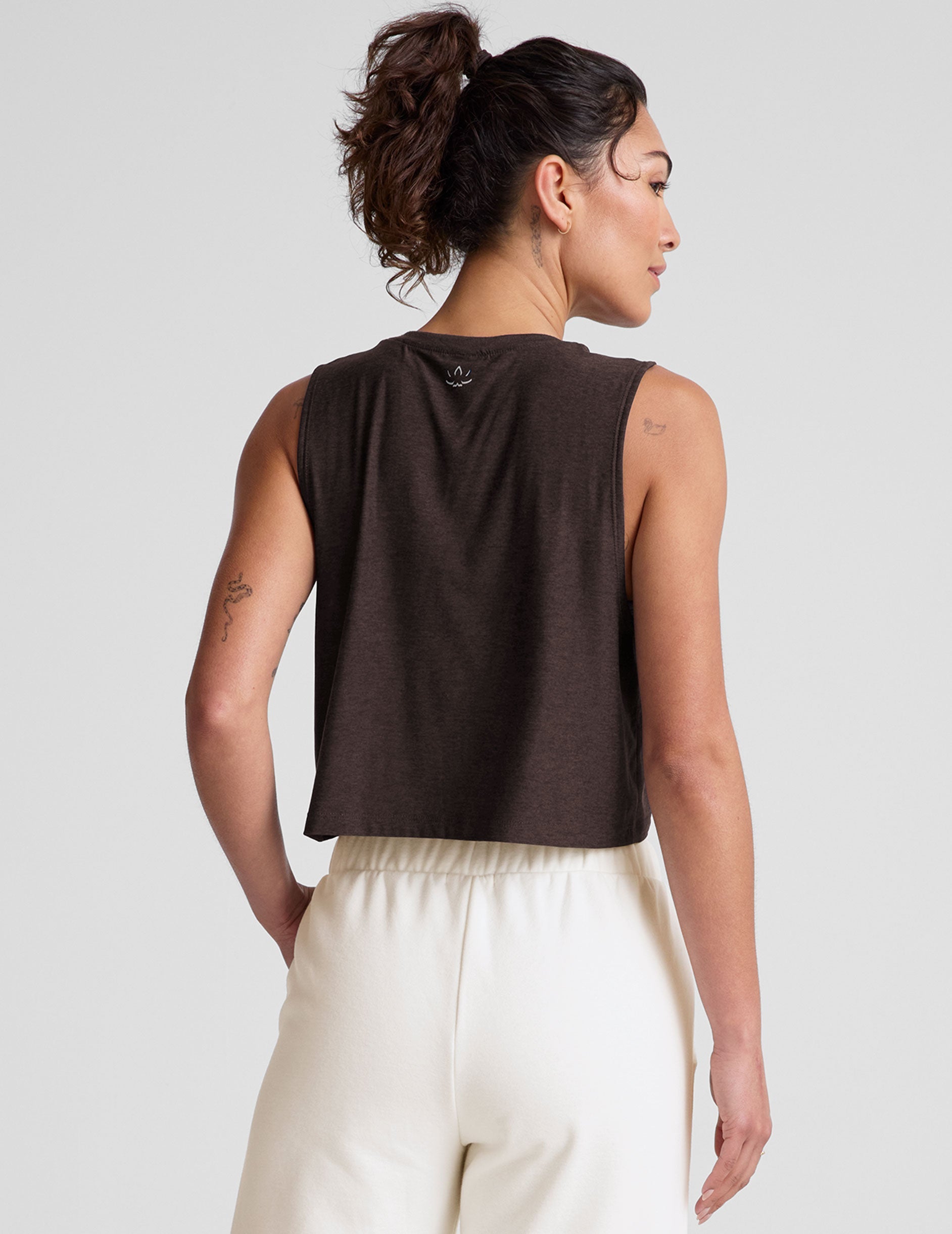 brown relaxed fit cropped tank top with a crew neckline.