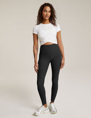 white short sleeve top with criss cross detail at front