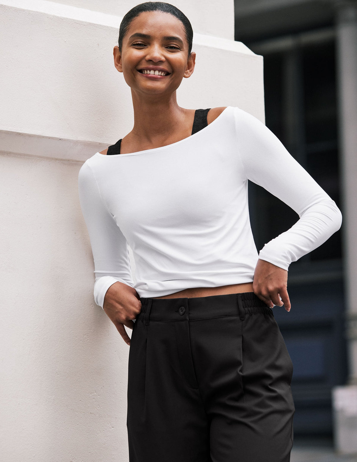 white boat neck long sleeve top.
