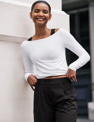 white boat neck long sleeve top.