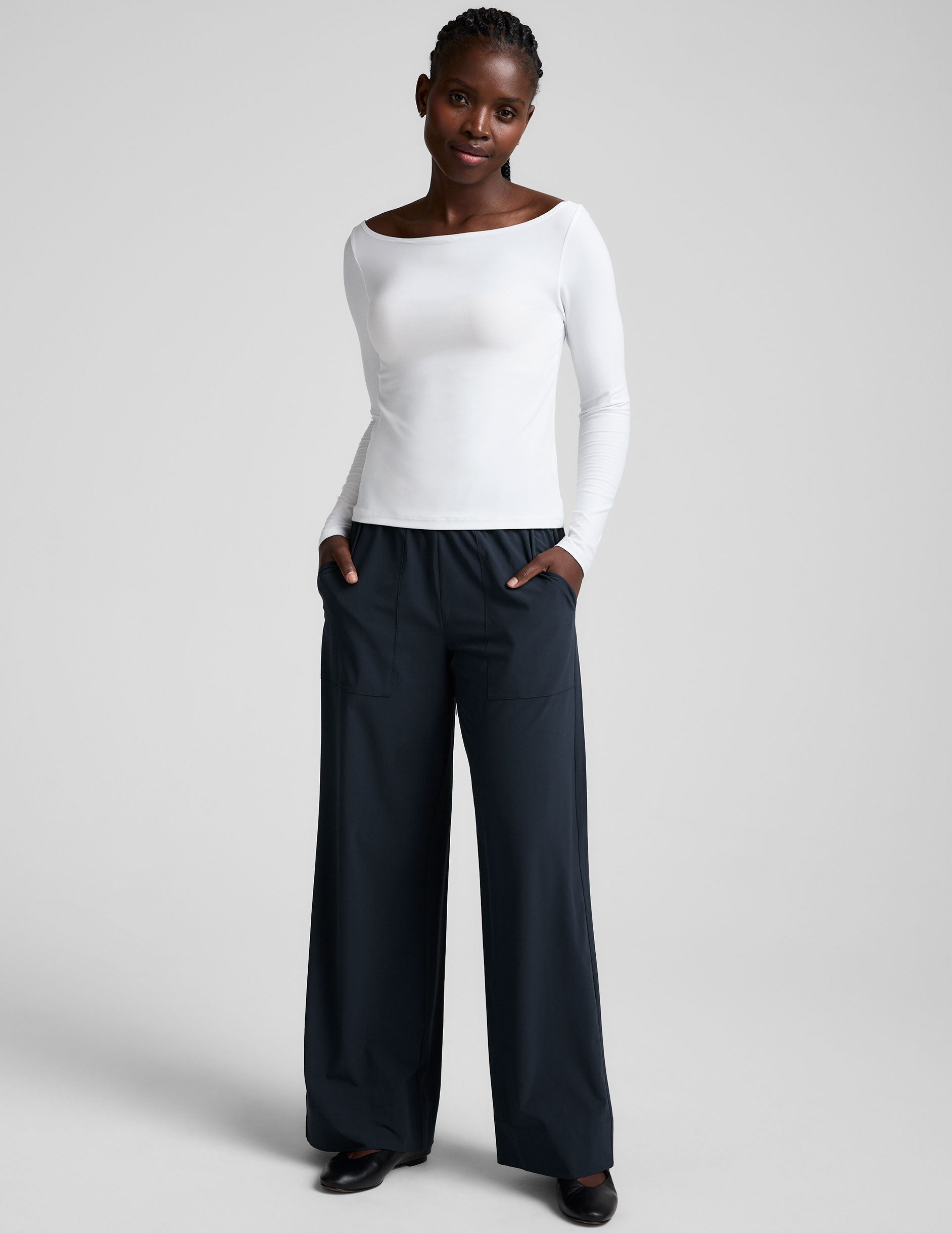 white boatneck long sleeve top.