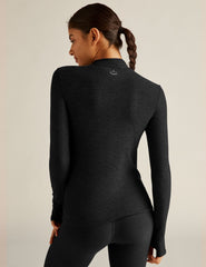black mock neck pullover.