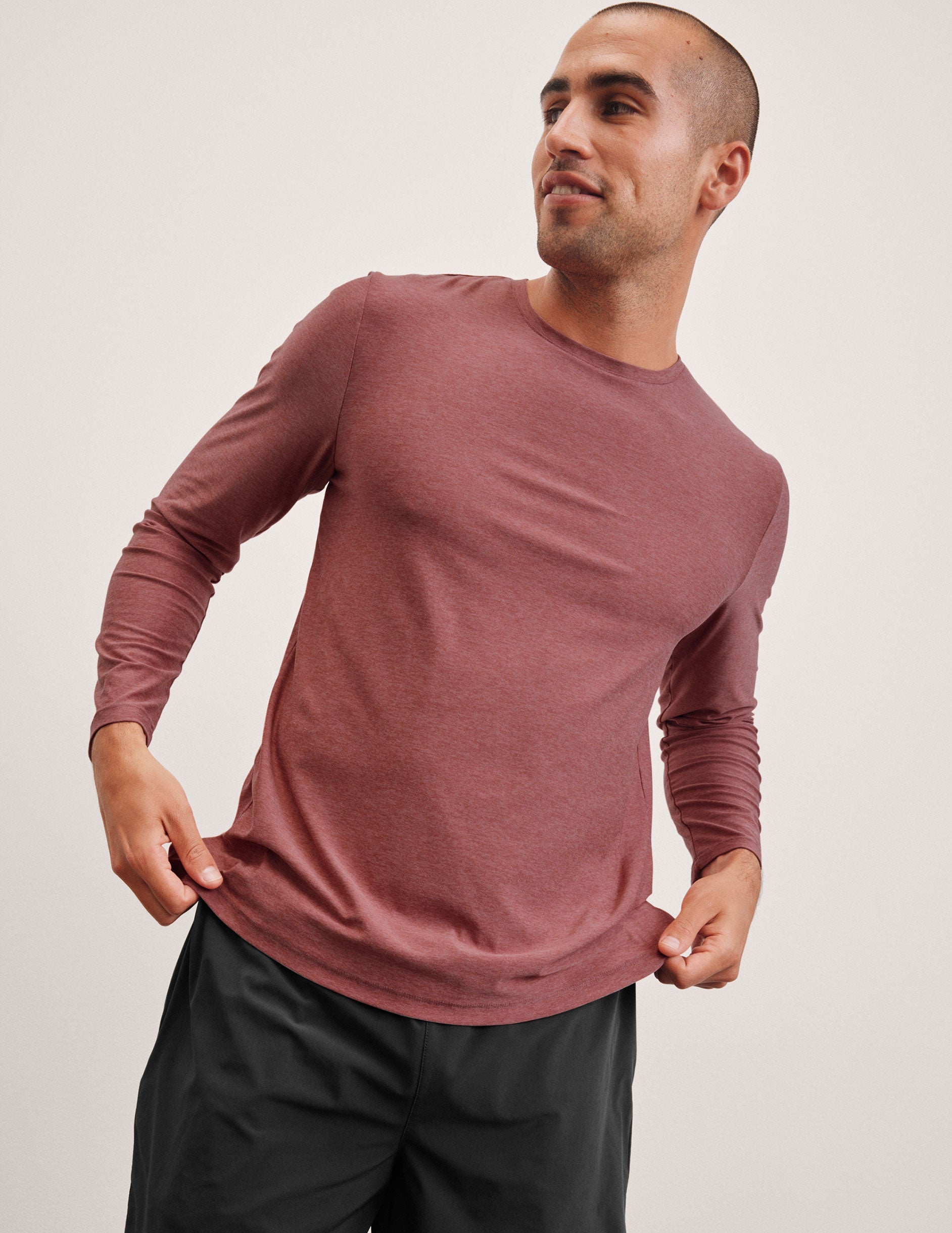 pink long sleeve crewneck top.