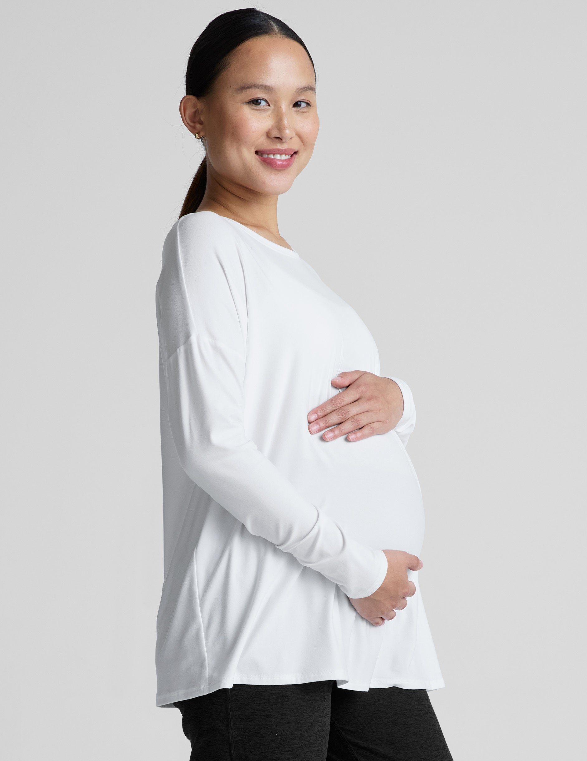 white long sleeve crew neck maternity top.