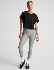 black relaxed fit cropped tee with a scoop neckline.