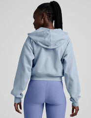 blue fleece zip-up jacket with a drawstring hood.