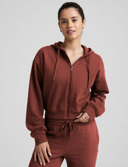 brown fleece zip-up jacket with a drawstring hood.