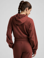 brown fleece zip-up jacket with a drawstring hood.
