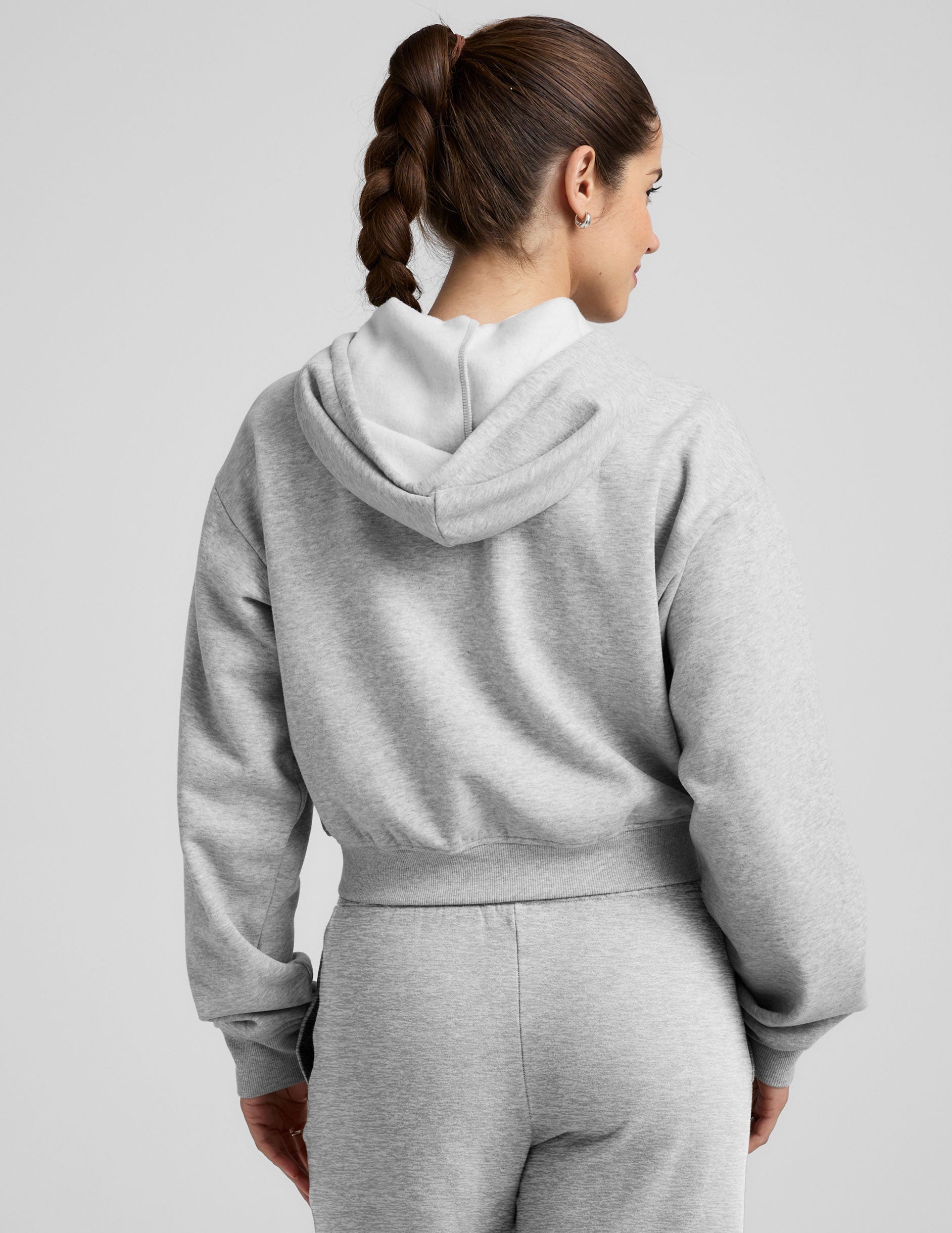 gray fleece zip-up jacket with a drawstring hood.