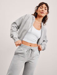 gray fleece zip-up jacket with a drawstring hood.