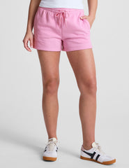 pink sweat shorts with pockets and a drawstring at waistband.
