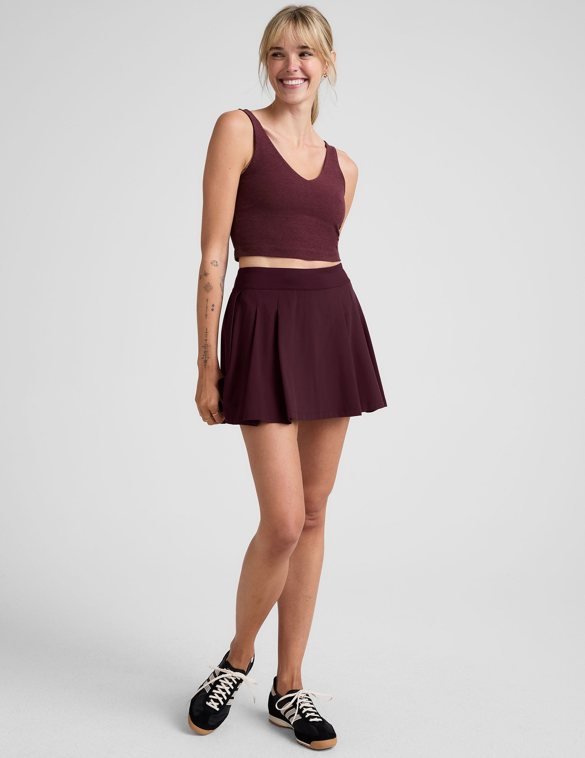 red mini skirt with built-in shorts with pockets.