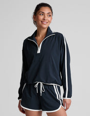 blue pullover with a half zip front​ and front kangaroo pocket​.