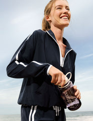 blue pullover with a half zip front​ and front kangaroo pocket​.
