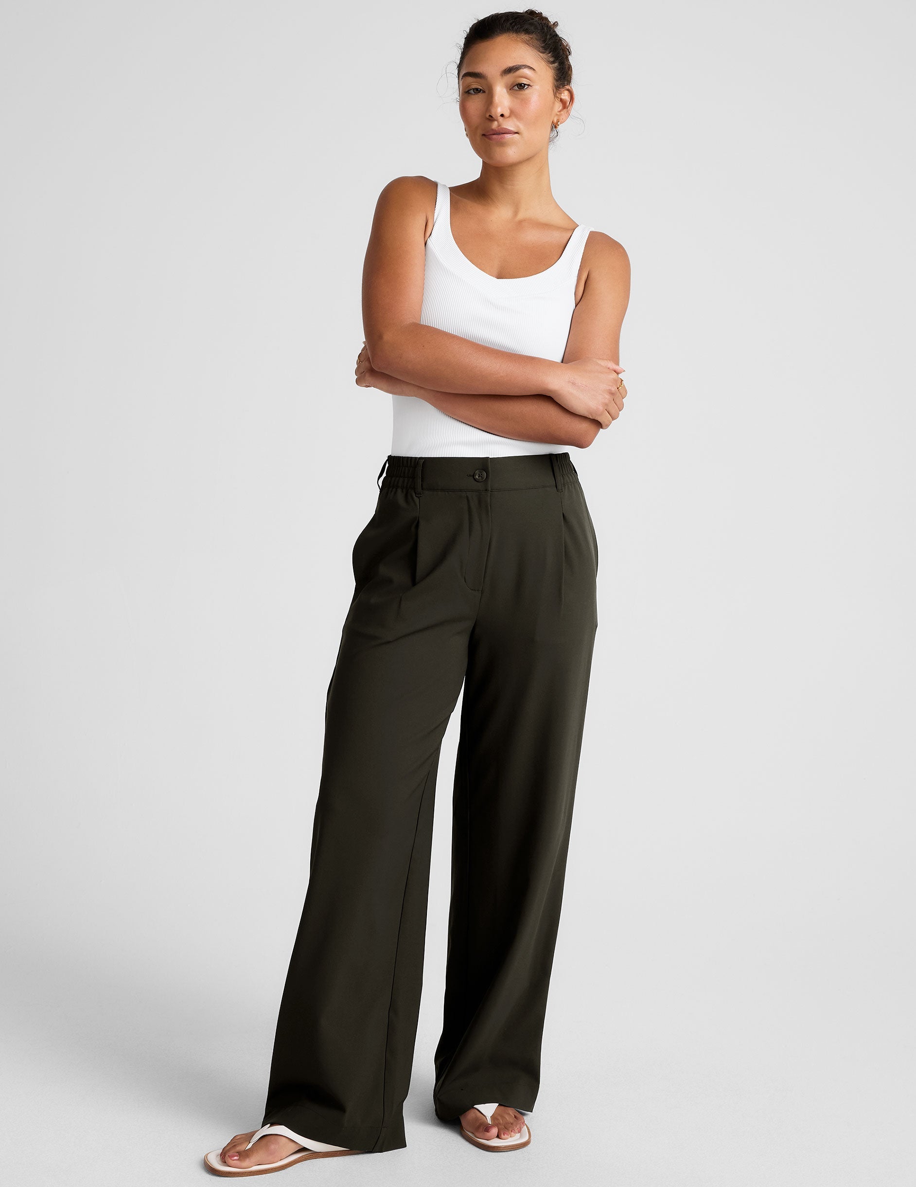 green trouser pants with pockets.