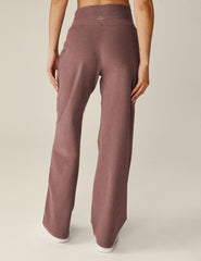 red high-waisted wide leg pants with pockets.