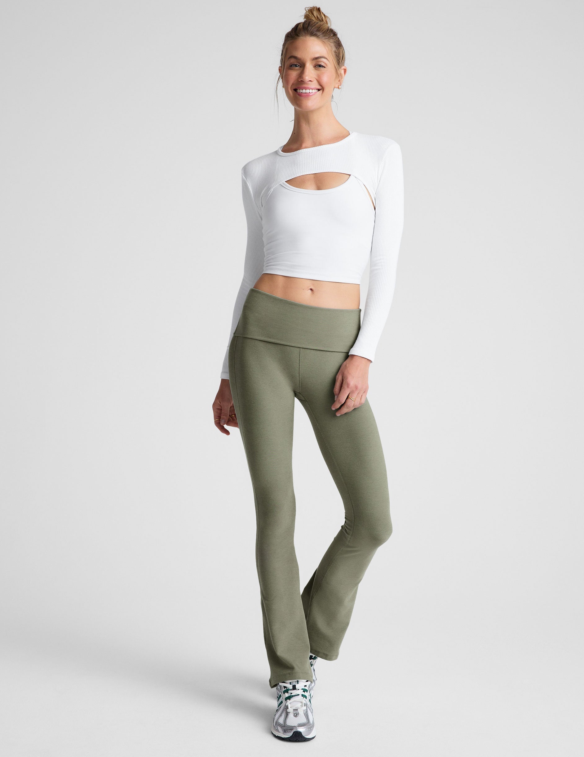 green bootcut pants with a foldover waistband.
