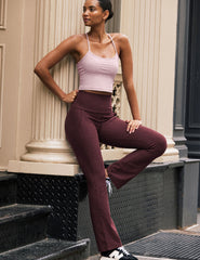 red high-waisted bootcut pants with pockets.