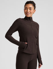 brown zip-up mock neck jacket with pockets and thumbholes.