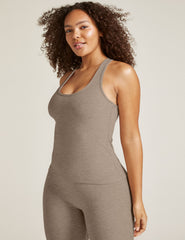 beige tank top.