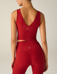 red cropped tank top with a front and back v-line.