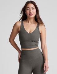 gray cropped length tank top with a front and back V neckline and self shelf bra. paired with high-waisted 5" inseam length biker shorts. 
