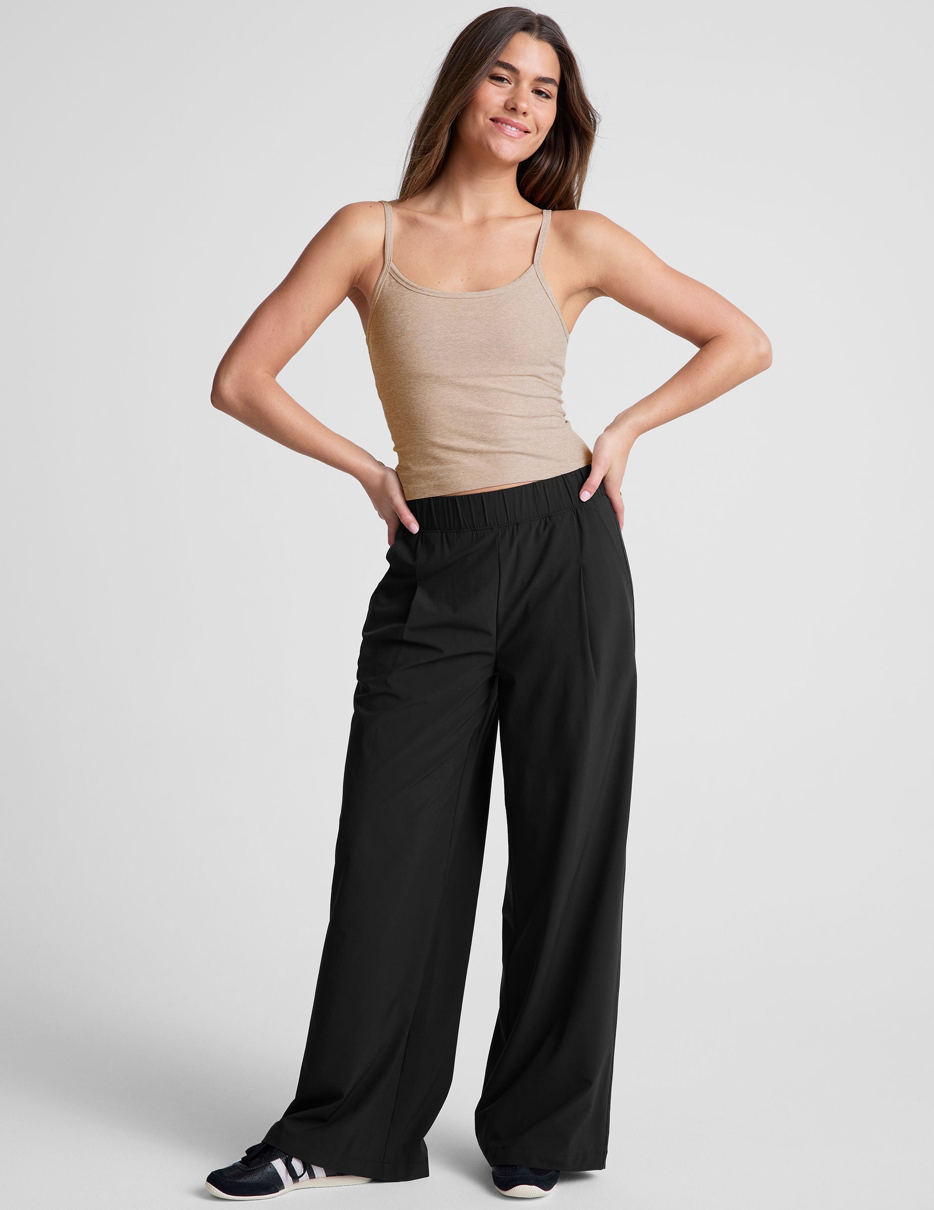 brown waist length tank top with adjustable straps.