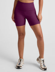 purple high-waisted, 5" inseam biker shorts. 