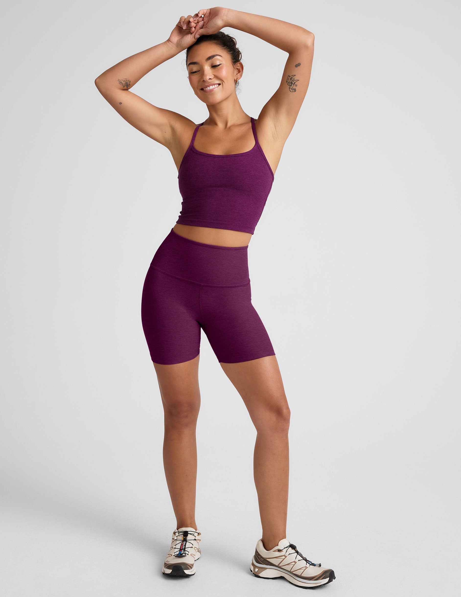 purple high-waisted, 5" inseam biker shorts. 