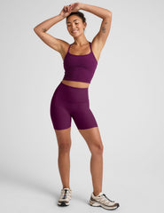 purple high-waisted, 5" inseam biker shorts. 