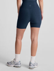 blue high-waisted 5" inseam biker shorts. 
