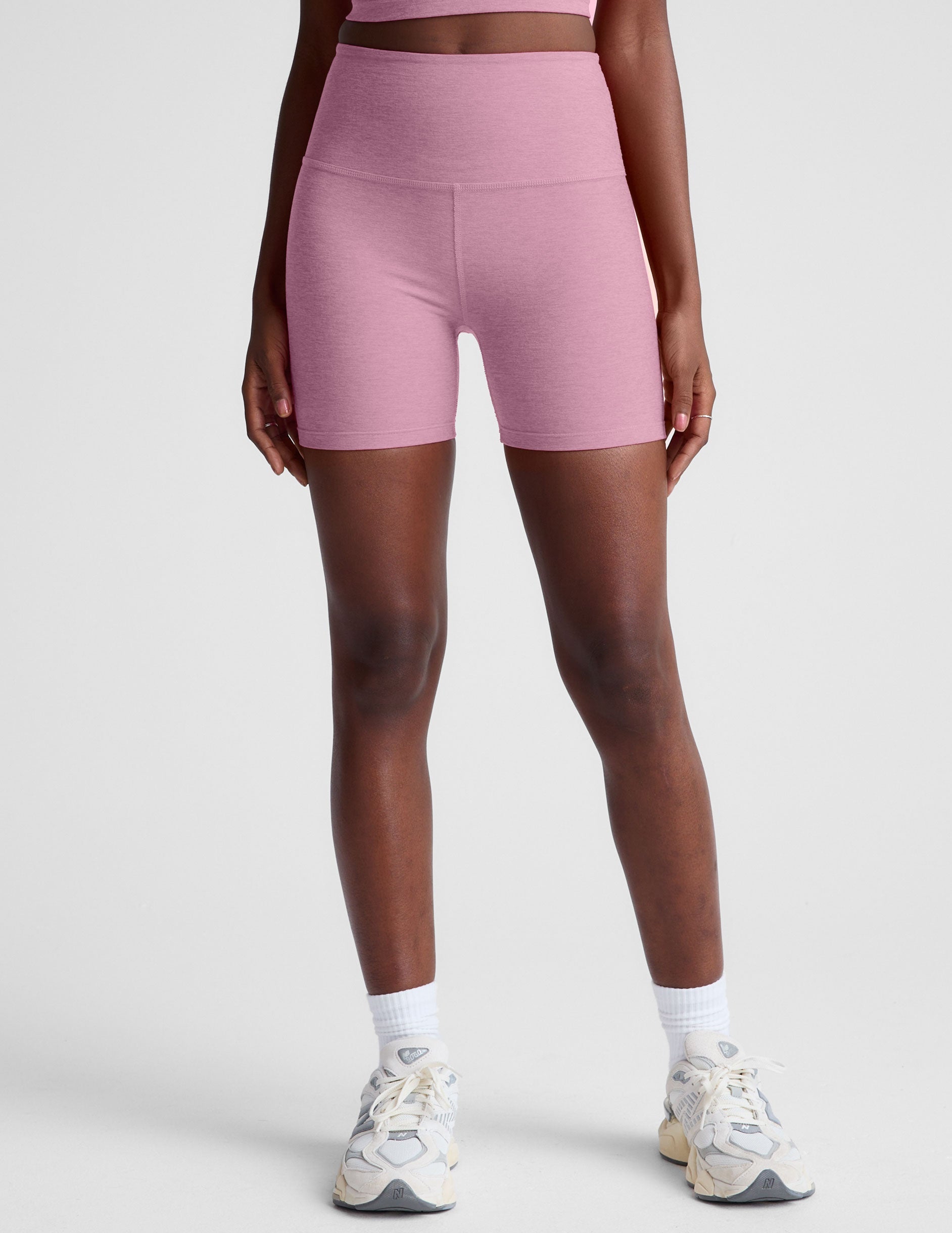 pink high-waisted 5" biker shorts. 
