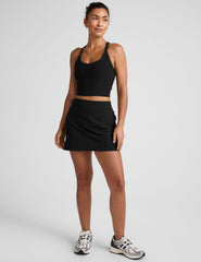 black a-line skirt with built-in shorts with pockets.