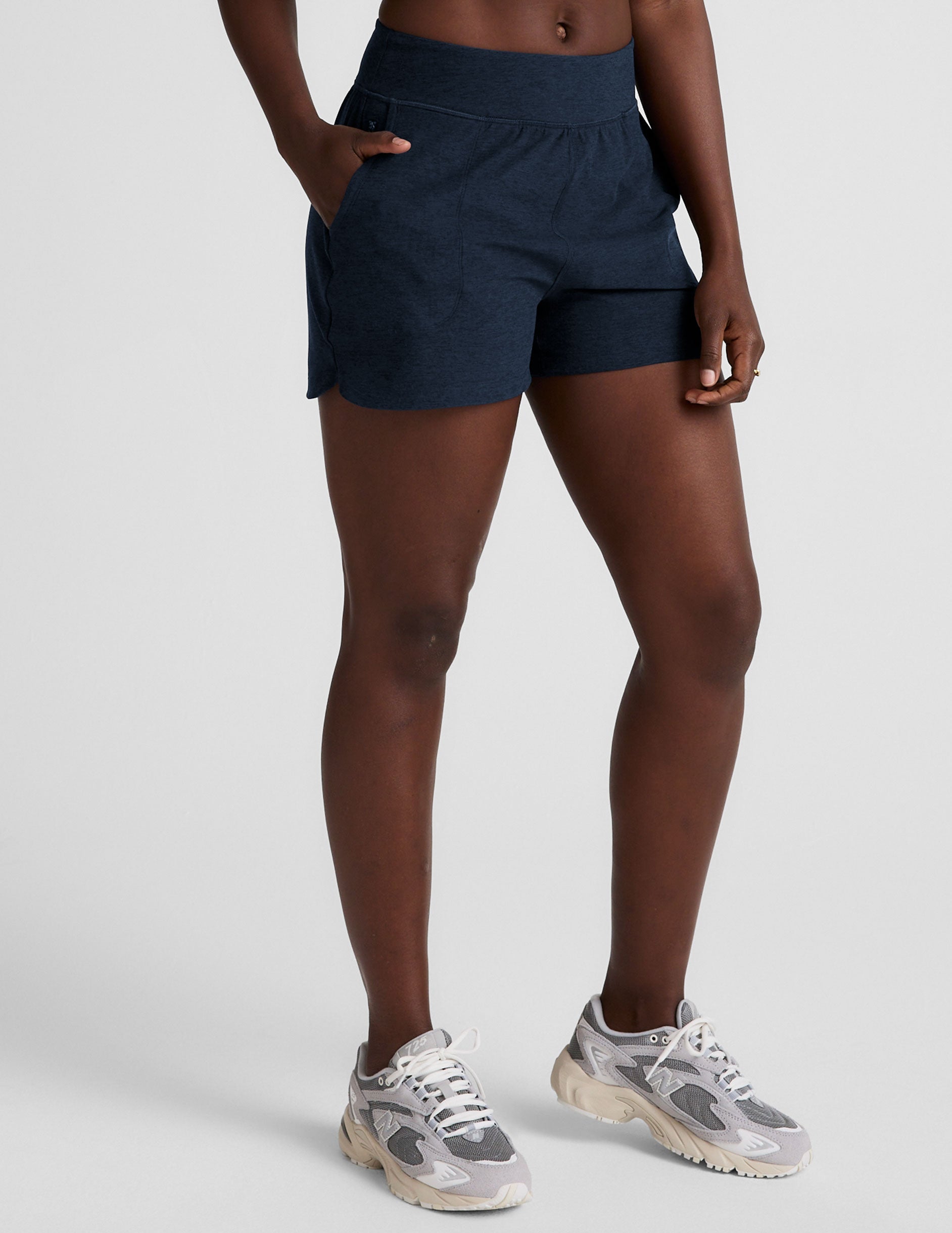 blue mid-rise spacedye shorts with pockets.