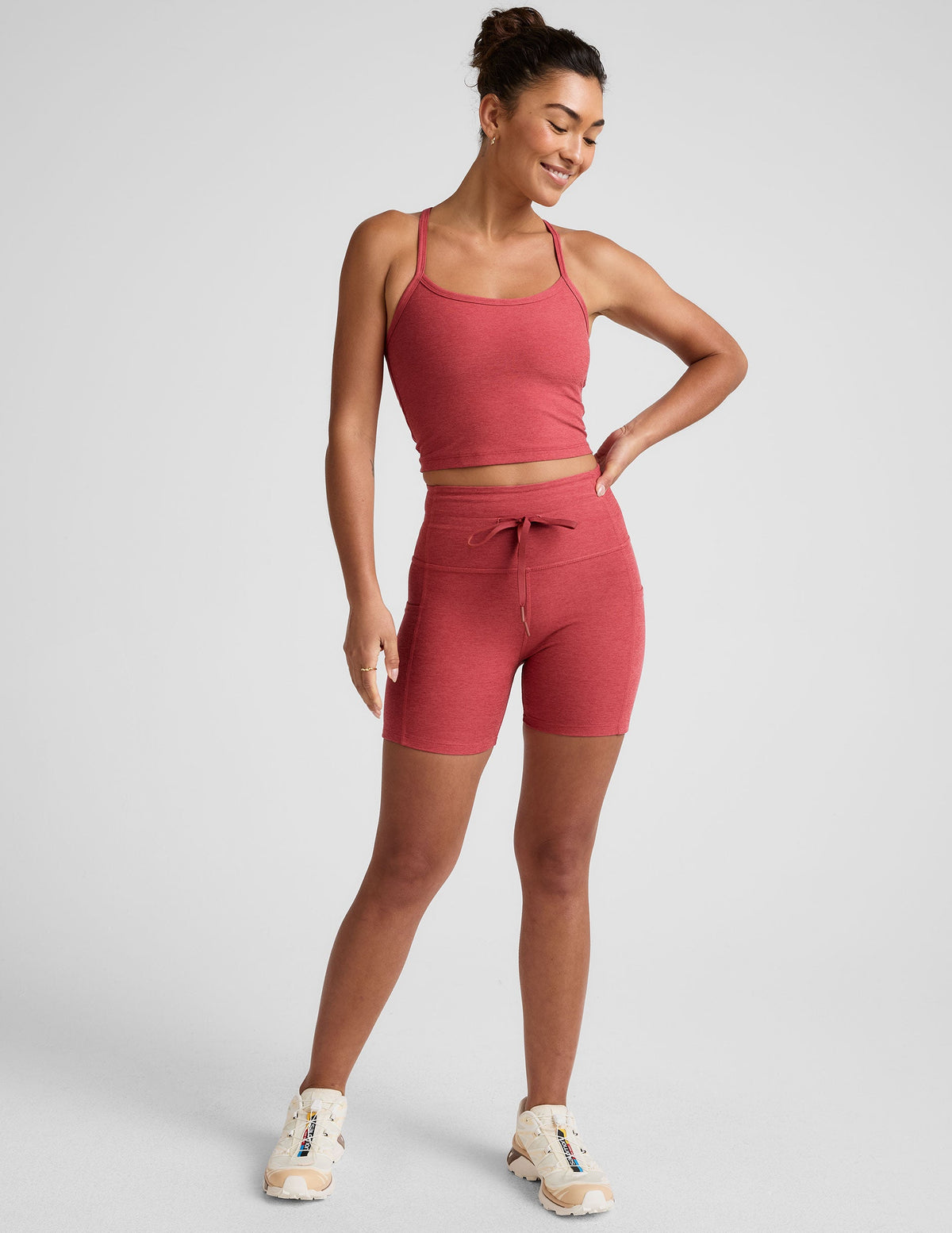 red high-waisted 5" inseam biker shorts with a drawstring at waistband and side pockets. 