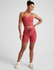 red high-waisted 5" inseam biker shorts with a drawstring at waistband and side pockets. 