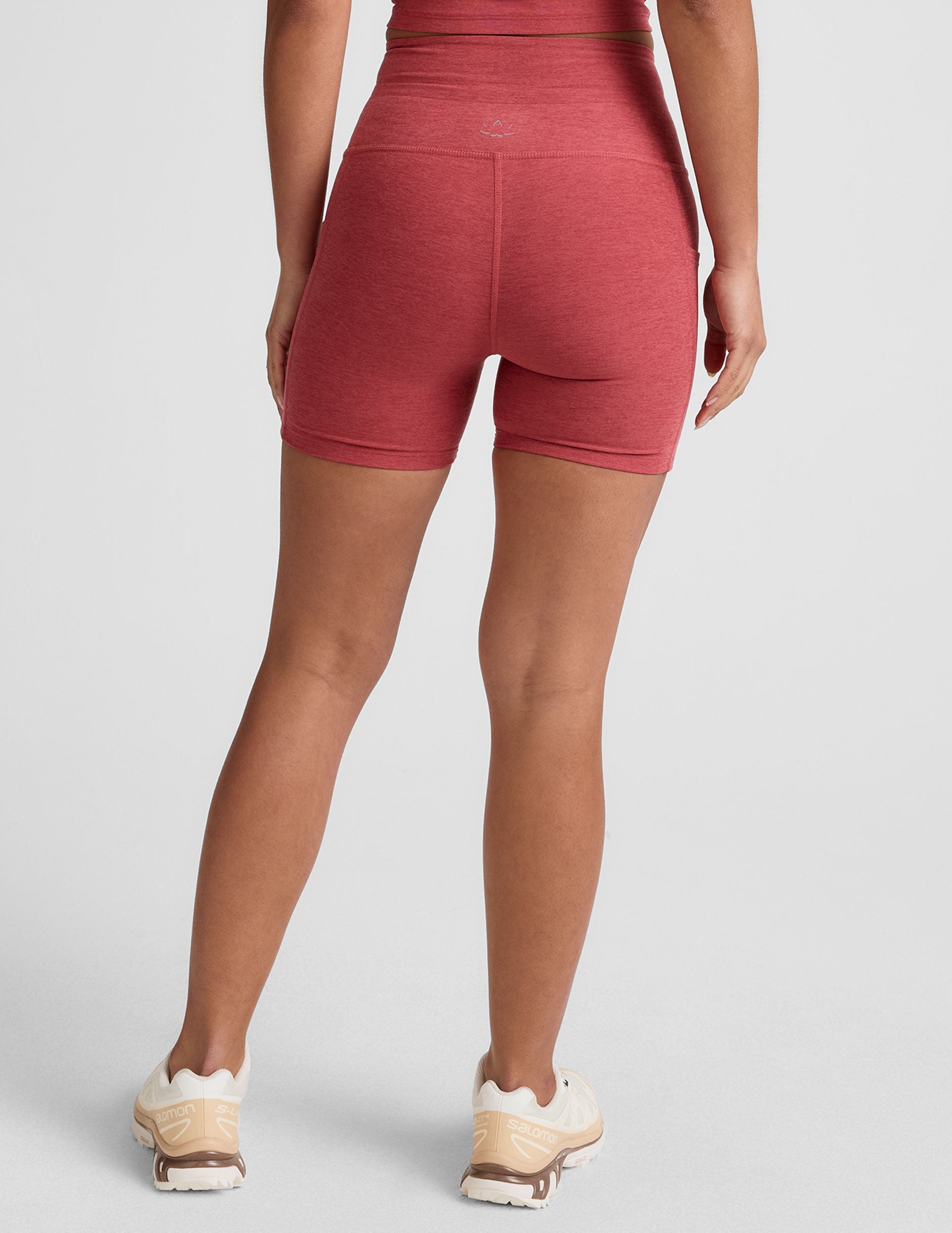 red high-waisted 5" inseam biker shorts with a drawstring at waistband and side pockets. 