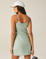 green mini spacedye dress with built-in pocket shorts.
