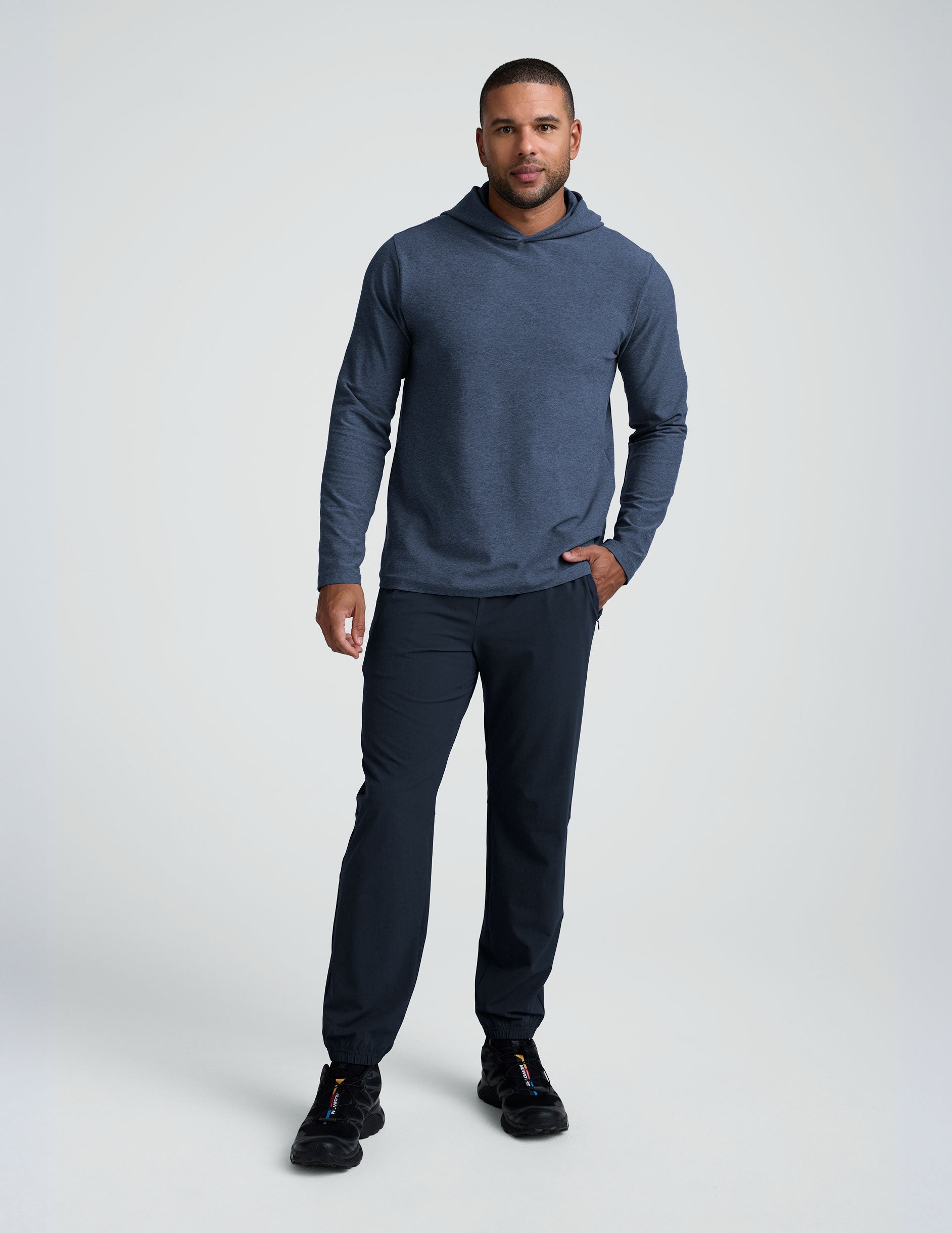 man wearing a blue hoodie sweatshirt.
