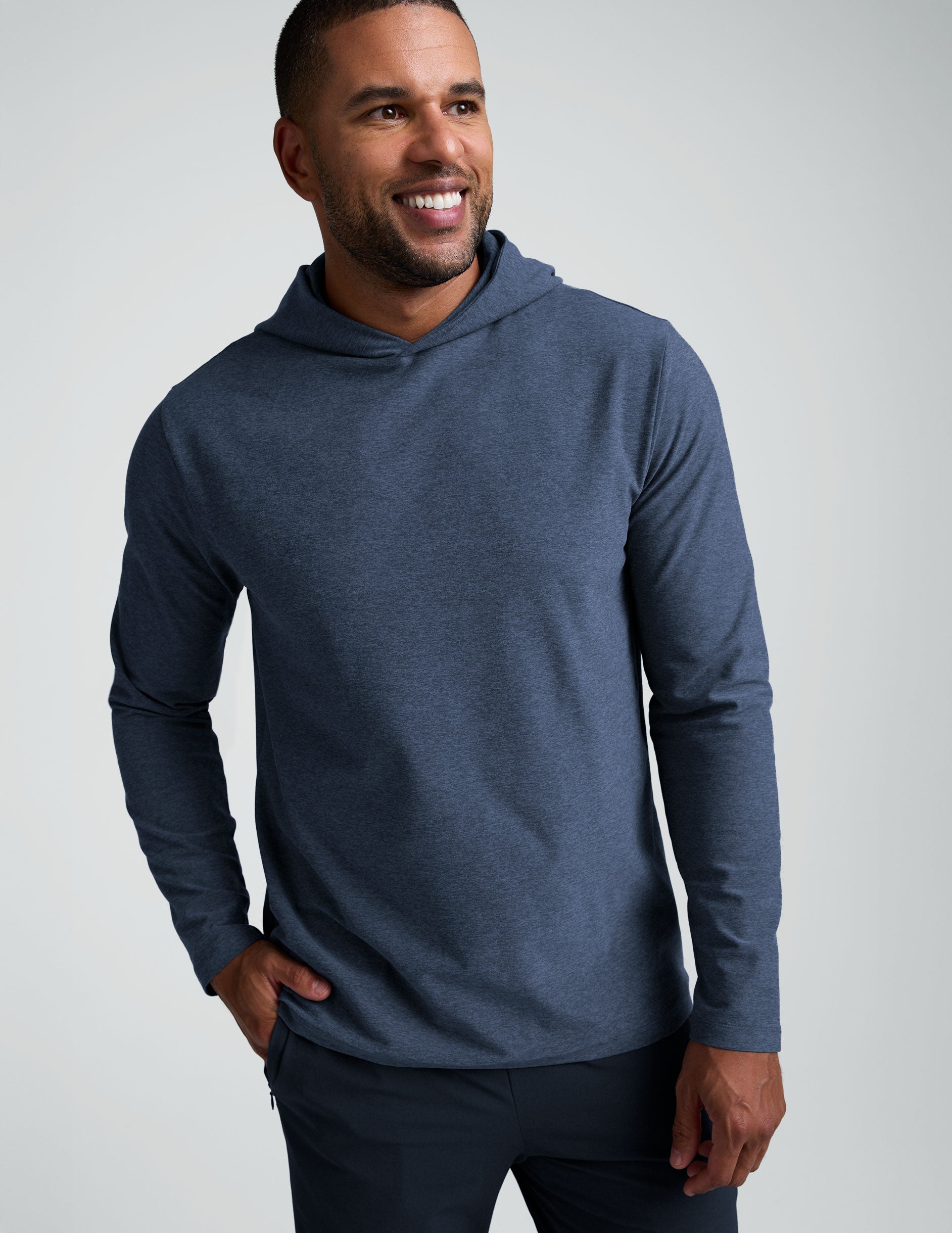 man wearing a blue hoodie sweatshirt.