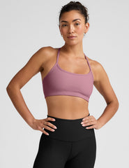 pink racerback bra with slim straps.