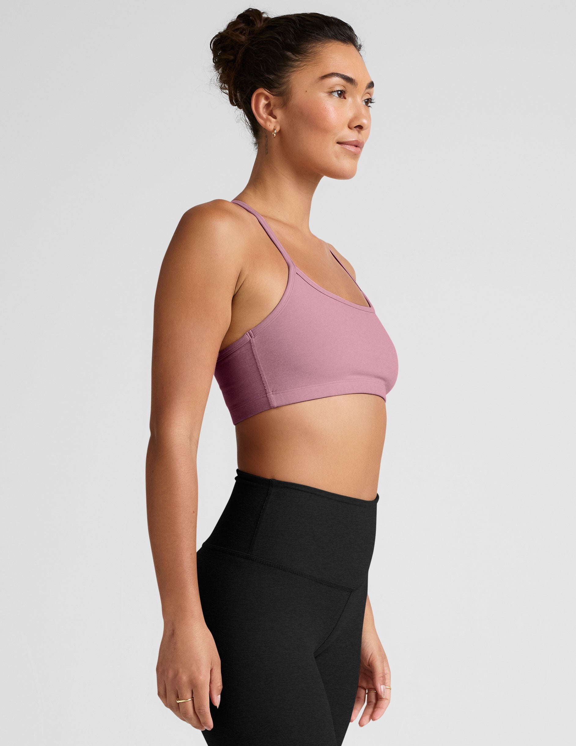 pink racerback bra with slim straps.